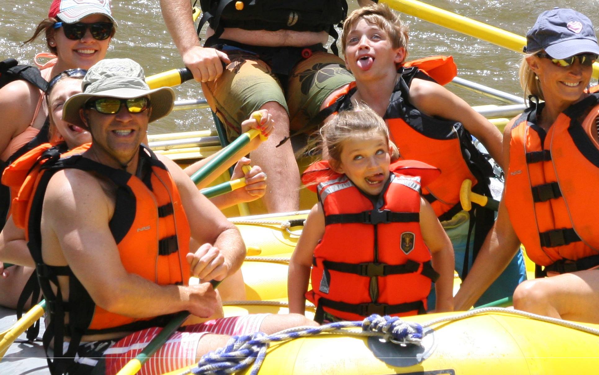 Family on the Colorado River during a whitewater rafting adventure